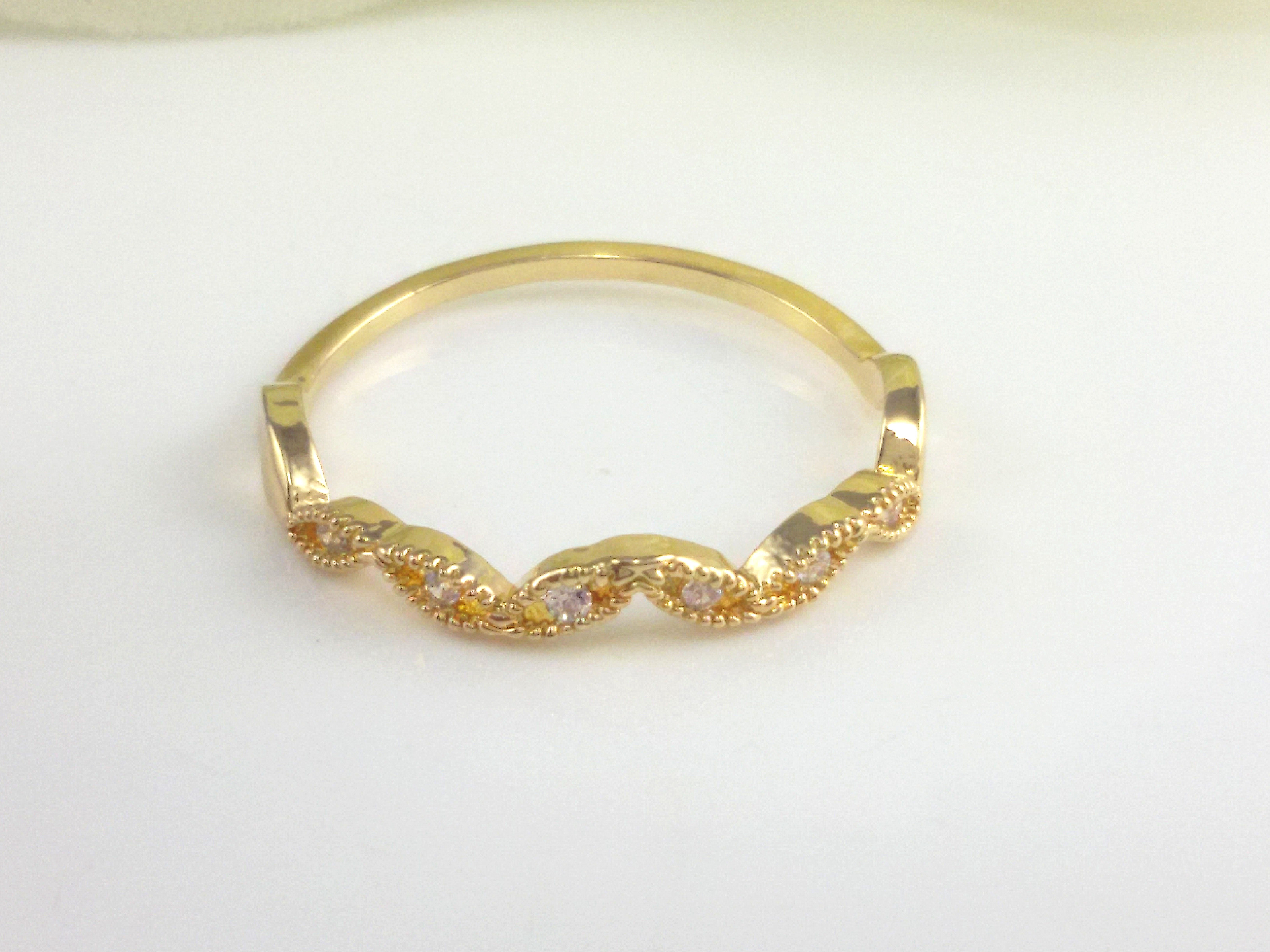 Curved shape zircon ring